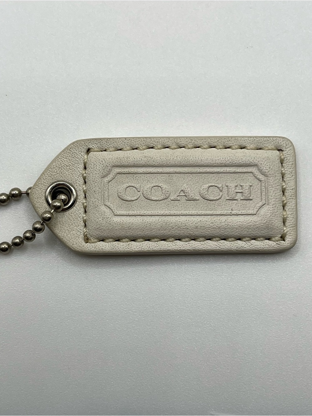 COACH White Leather Embossed Hang Tag with Ball Chain